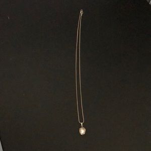 Silver chain, pearl necklace.